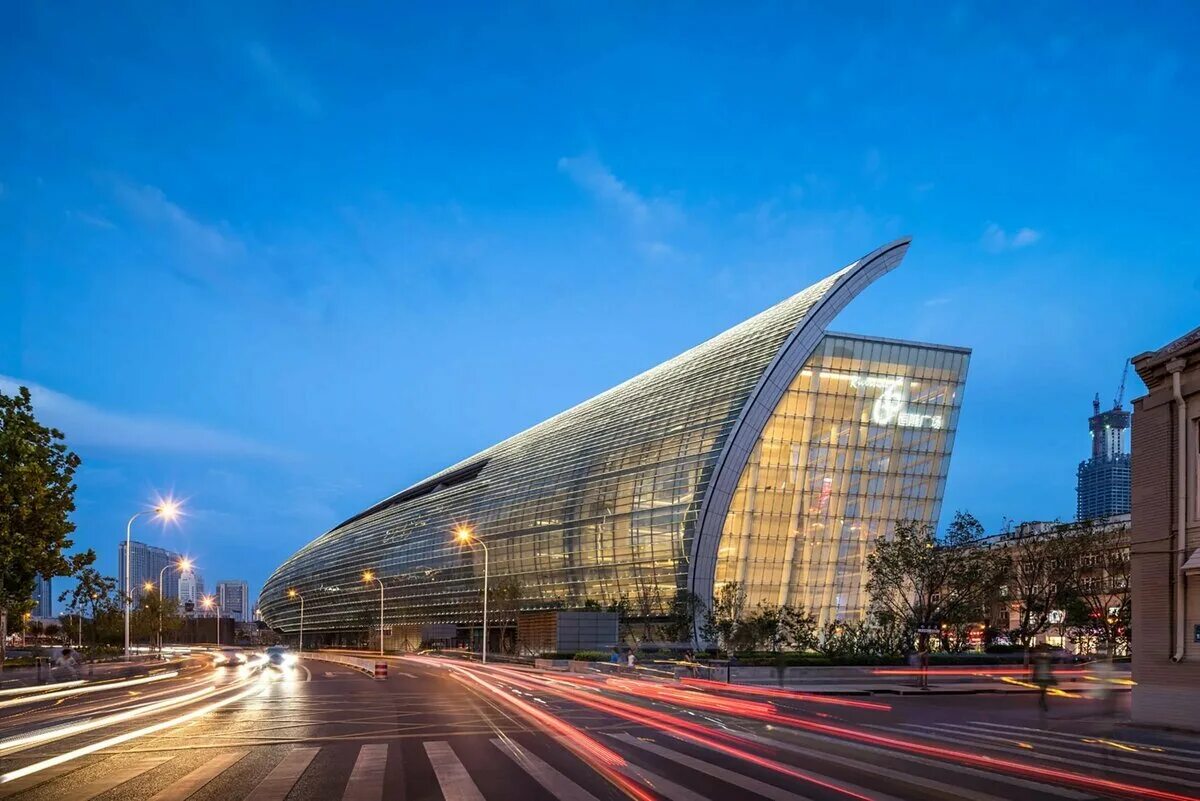 Фото здания. Riverside 66 Тяньцзинь, Китай. Архитектура. Архитектура торговых центров Китая. Красивые здания. Красивые современные здания.