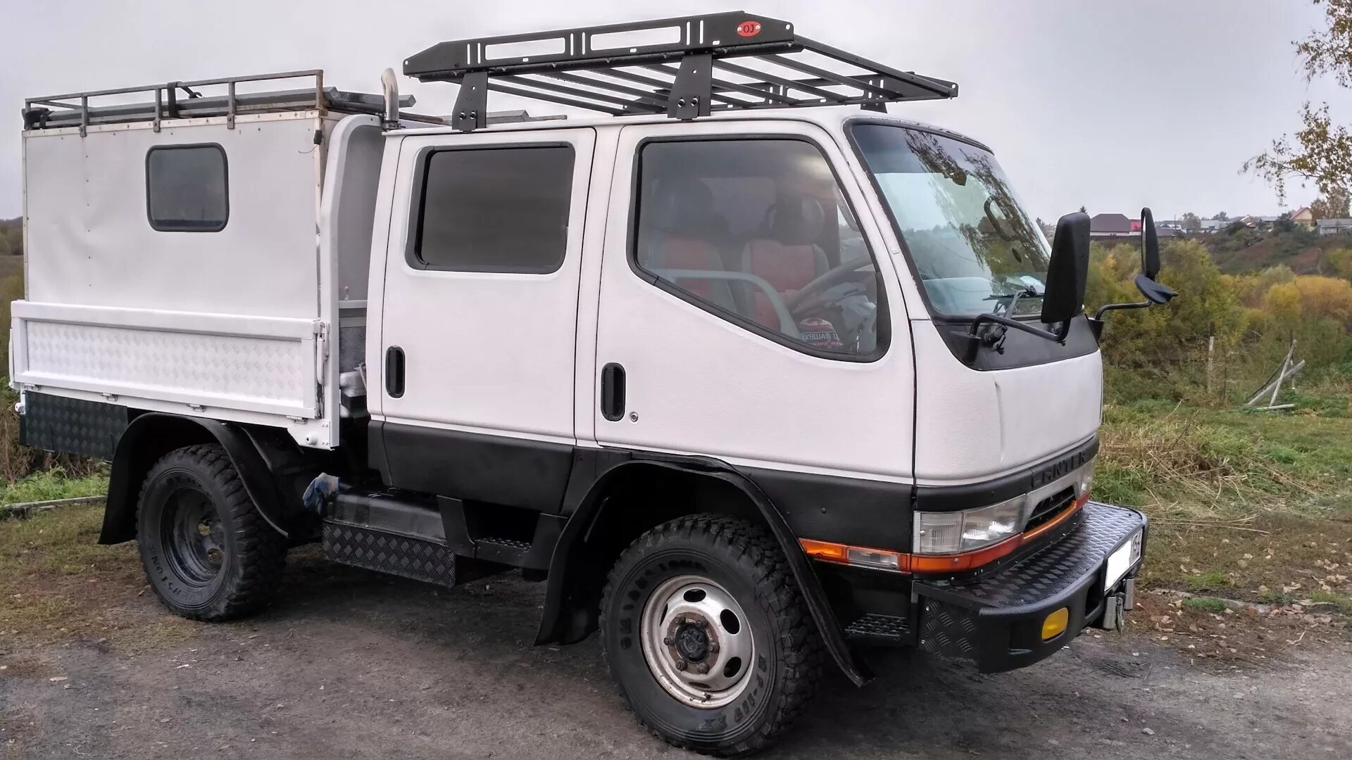 Грузовики 4вд приморский край. Mitsubishi Canter fd501b 4 WD двухкабинник. Mitsubishi Canter двухкабинник. Ниссан двухкабинник 4х4. Митсубиси Кантер двухкабинник 4х4.