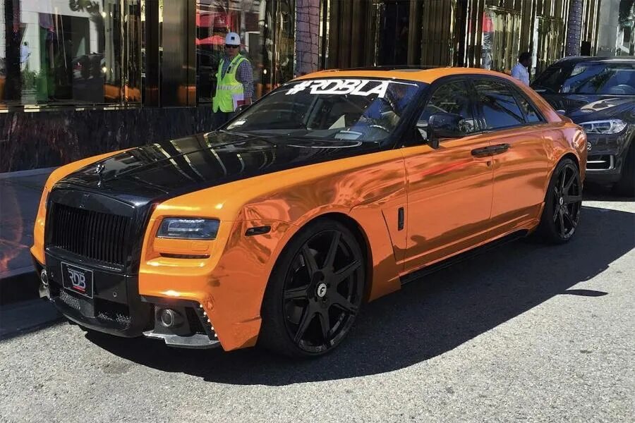 Роллс ройс тюнинг. Rolls royce ghost. ролл ройлстюнинг. rolls royce phantom mansory. роллс ройс оранжевый.