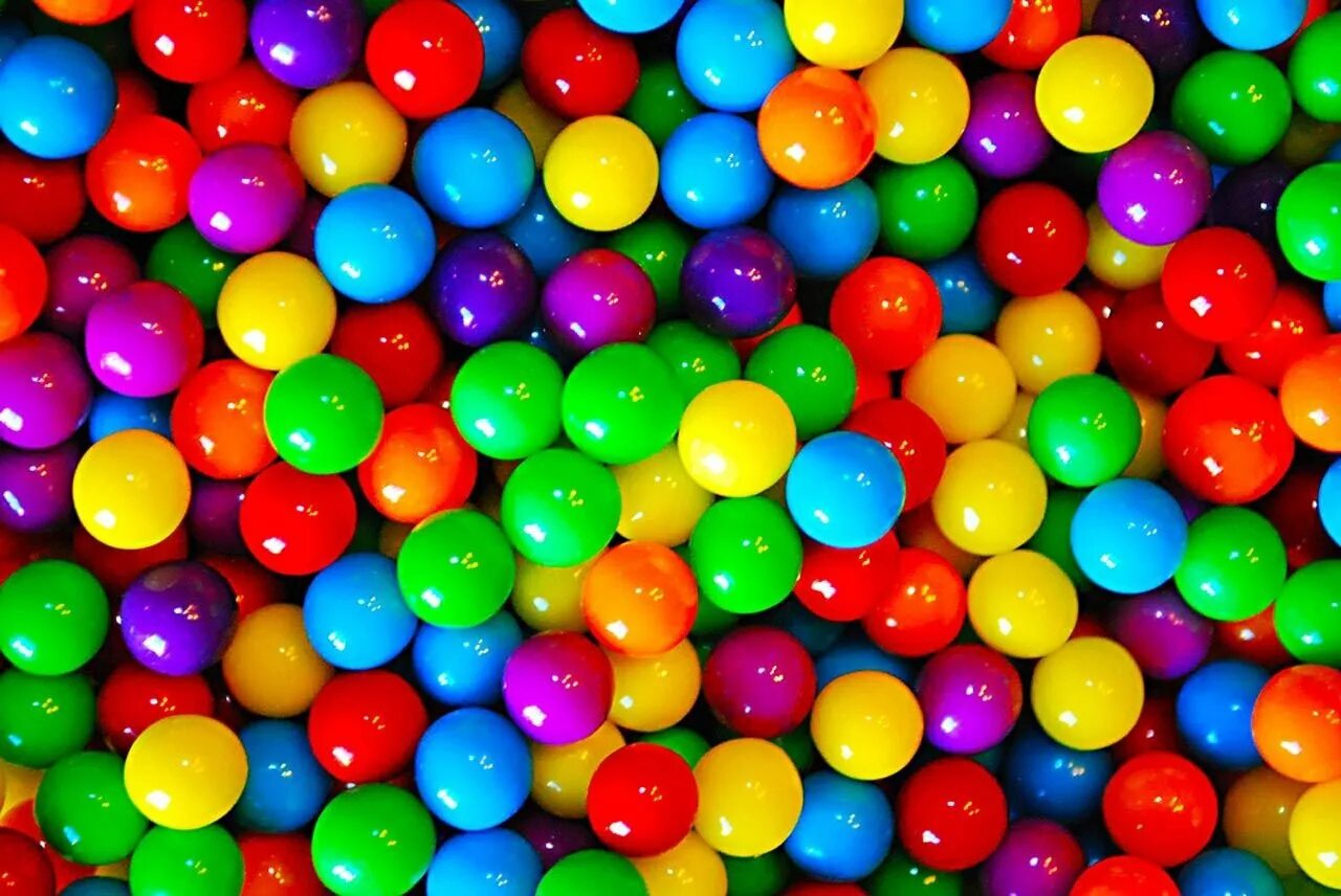 Текстура шаров. Разноцветные шарики. Разноцветные драже. Яркие картинки. Разноцветные яркие конфетки.