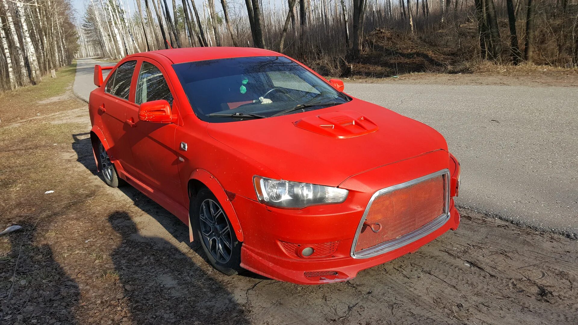 Mitsubishi Lancer 10 колхоз. Лансер 10 красный. Мицубиси Лансер 10 в обвесе красный. Мицубиси Лансер 10 колхоз.