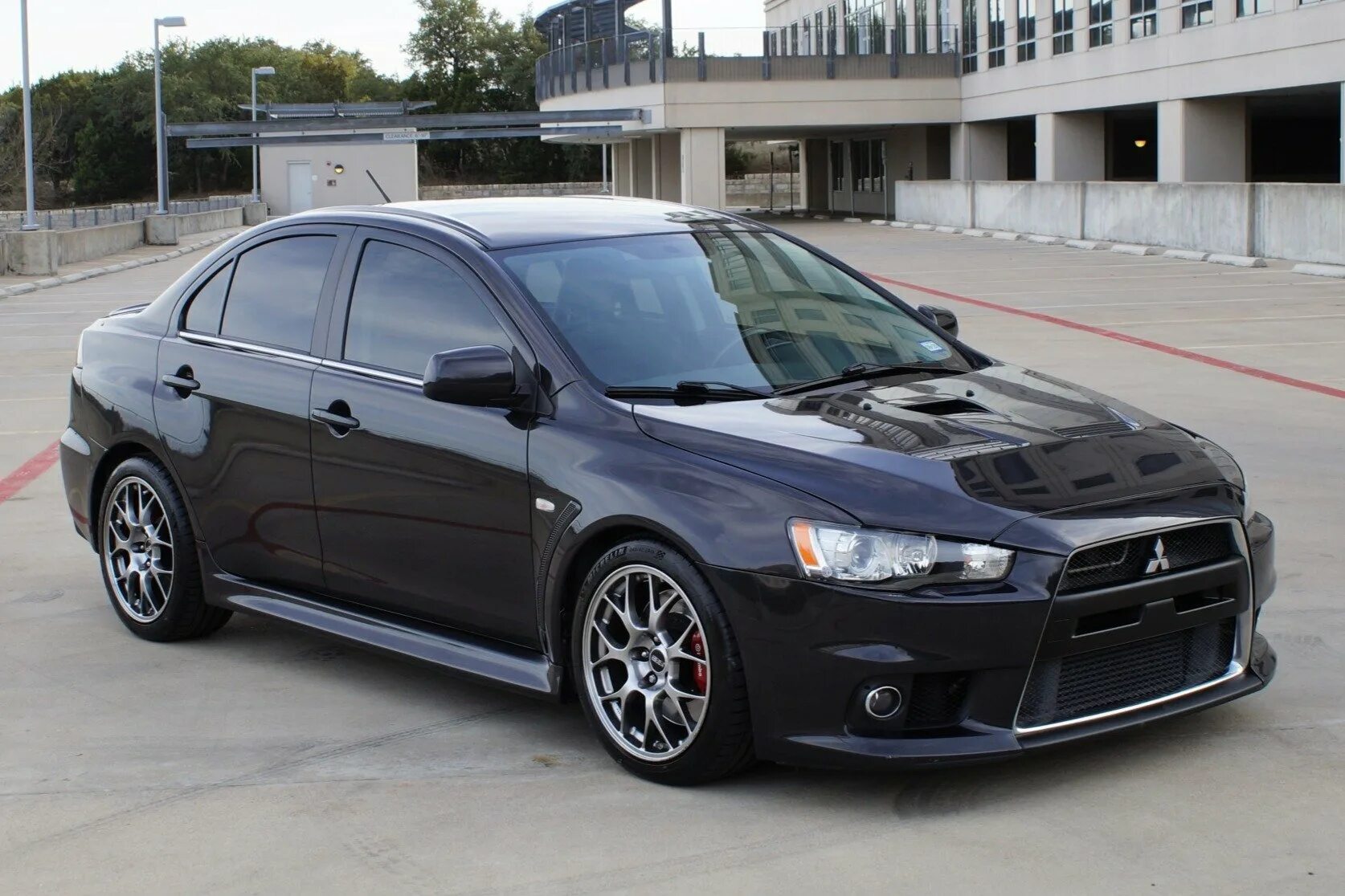 Mitsubishi lancer 10 седан. Mitsubishi lancer evolution 10. Каталог лансер 10. Лансер 10 поколения. Mitsubishi lancer 10 restyling.
