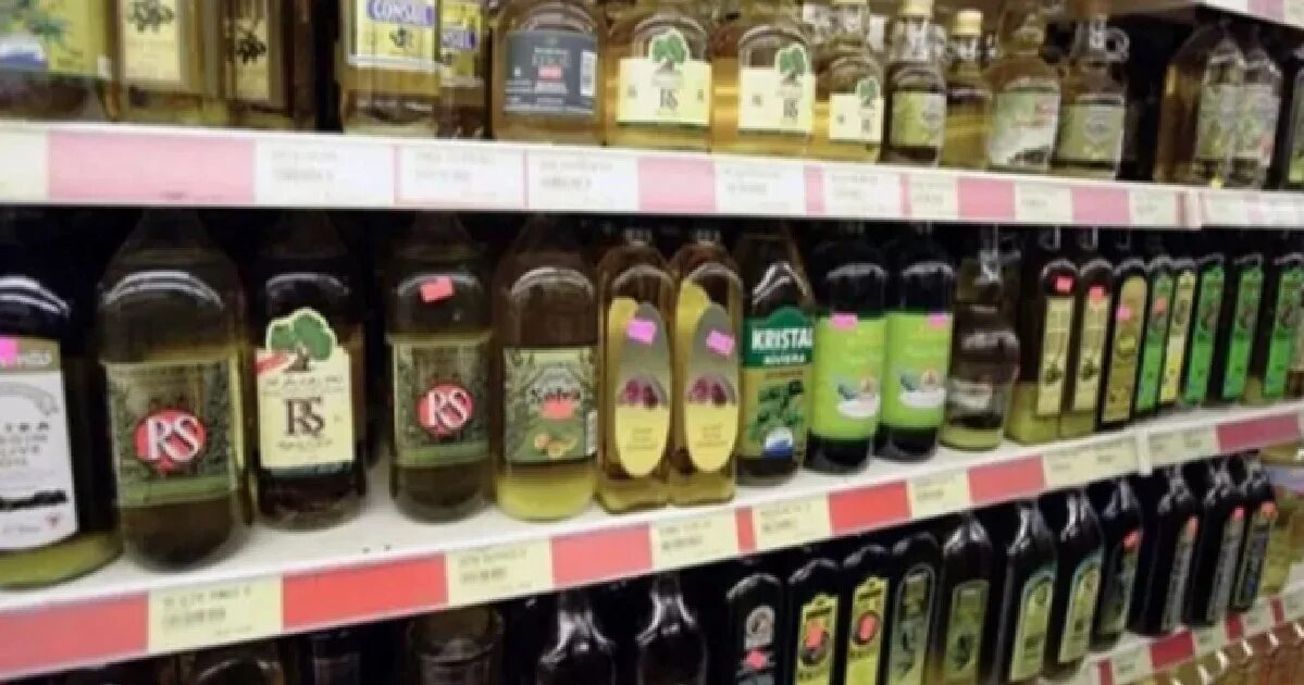 Как отличить оливковое масло. Оливковое масло в магазине. Оливковое масло кислотность 0.2. Фальсифицированное масло в магазине.