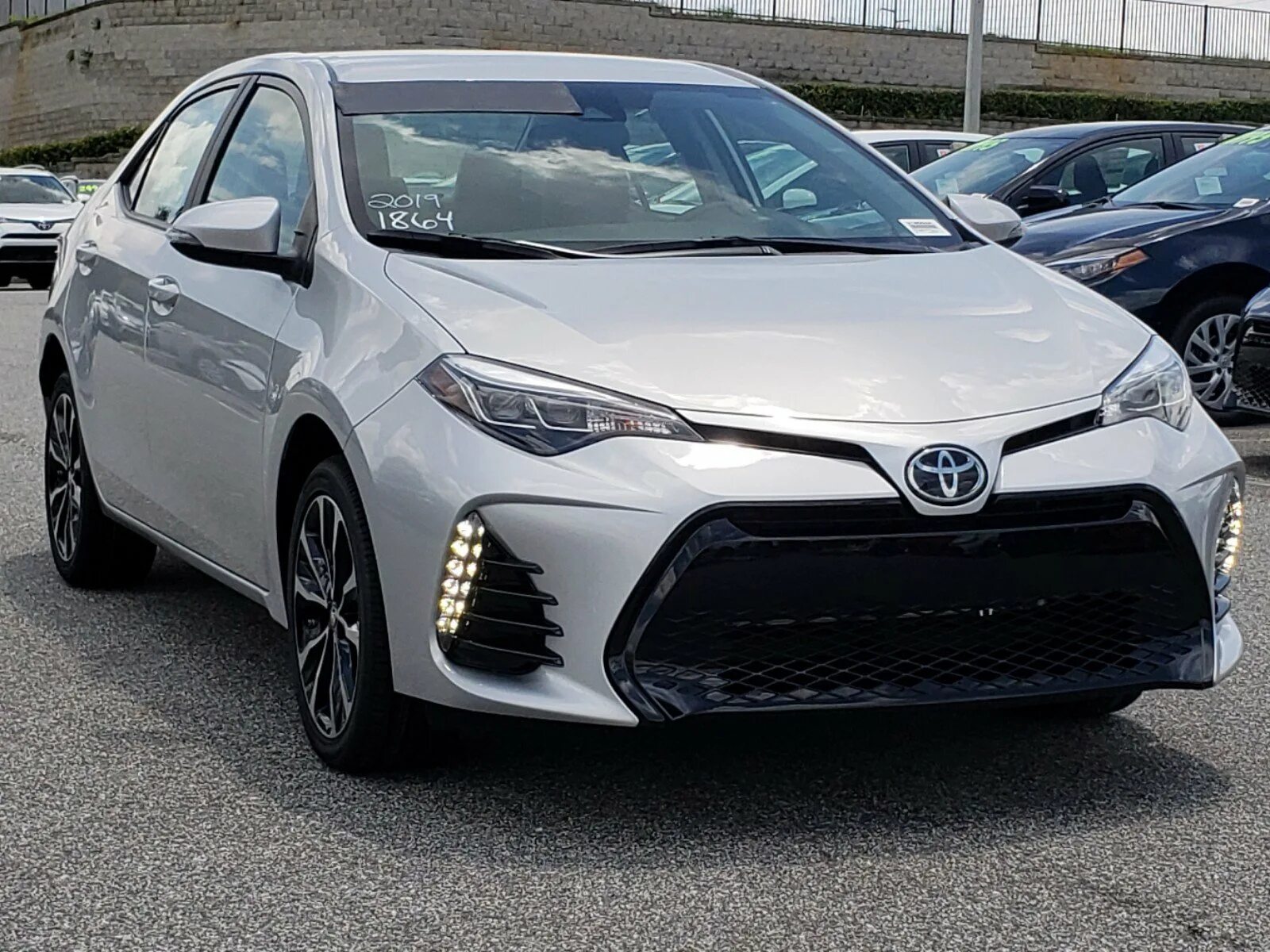 Королла 2019 кузов. Toyota corolla 2018. Toyota corolla 2021 седан. Toyota corolla sedan 2020. Toyota corolla 2019 sedan.