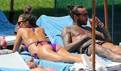 MEGAN MCKENNA and DANIELLE ARMSTRONG in Bikinis at a Pool in Mallorca 07/03...