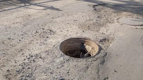 Яма на дороге размер