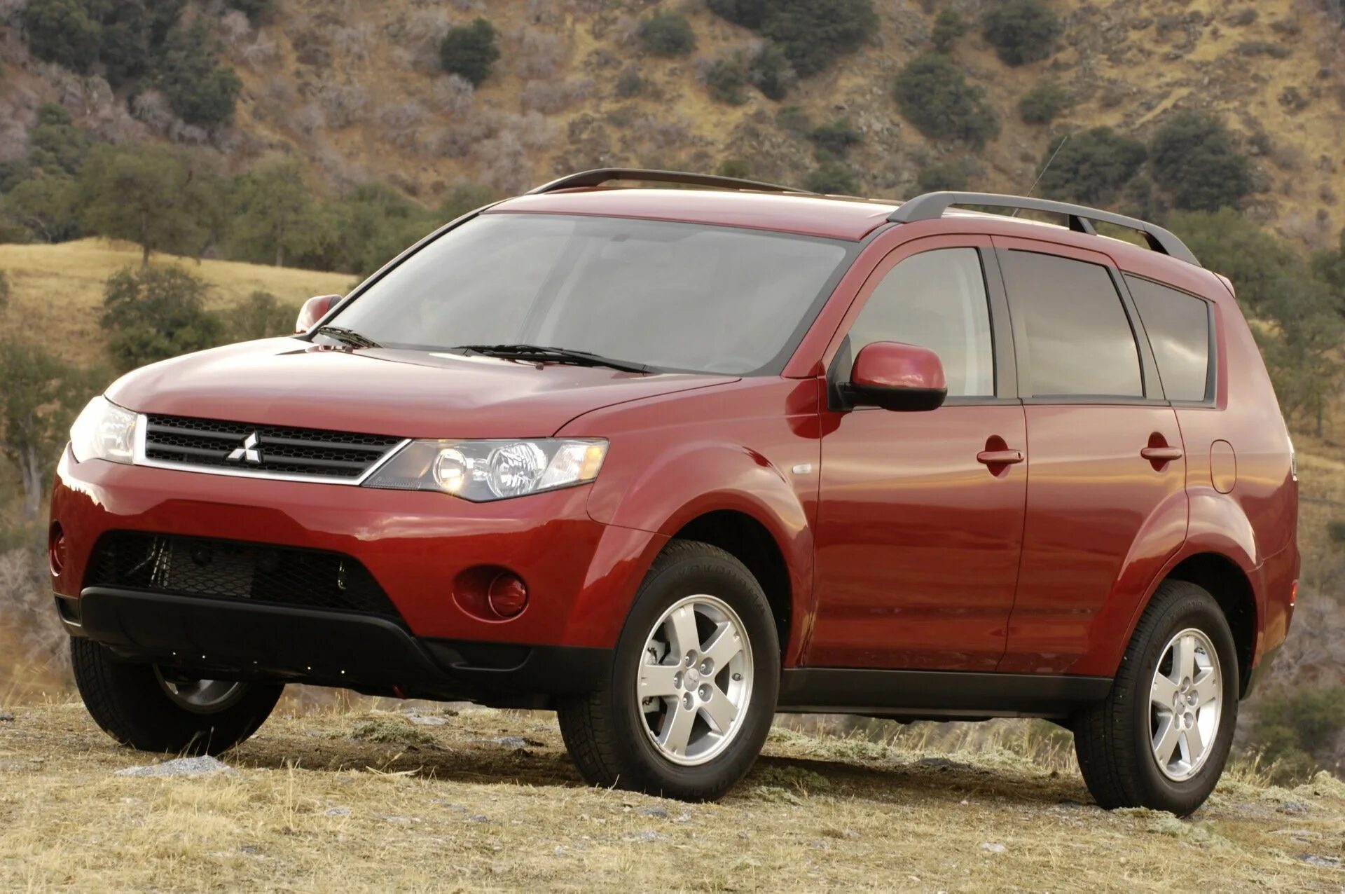 Mitsubishi название. Mitsubishi Outlander 2007-2008. Mitsubishi Outlander 2007. Mitsubishi Outlander 2008. Митсубиши Аутлендер 2008.