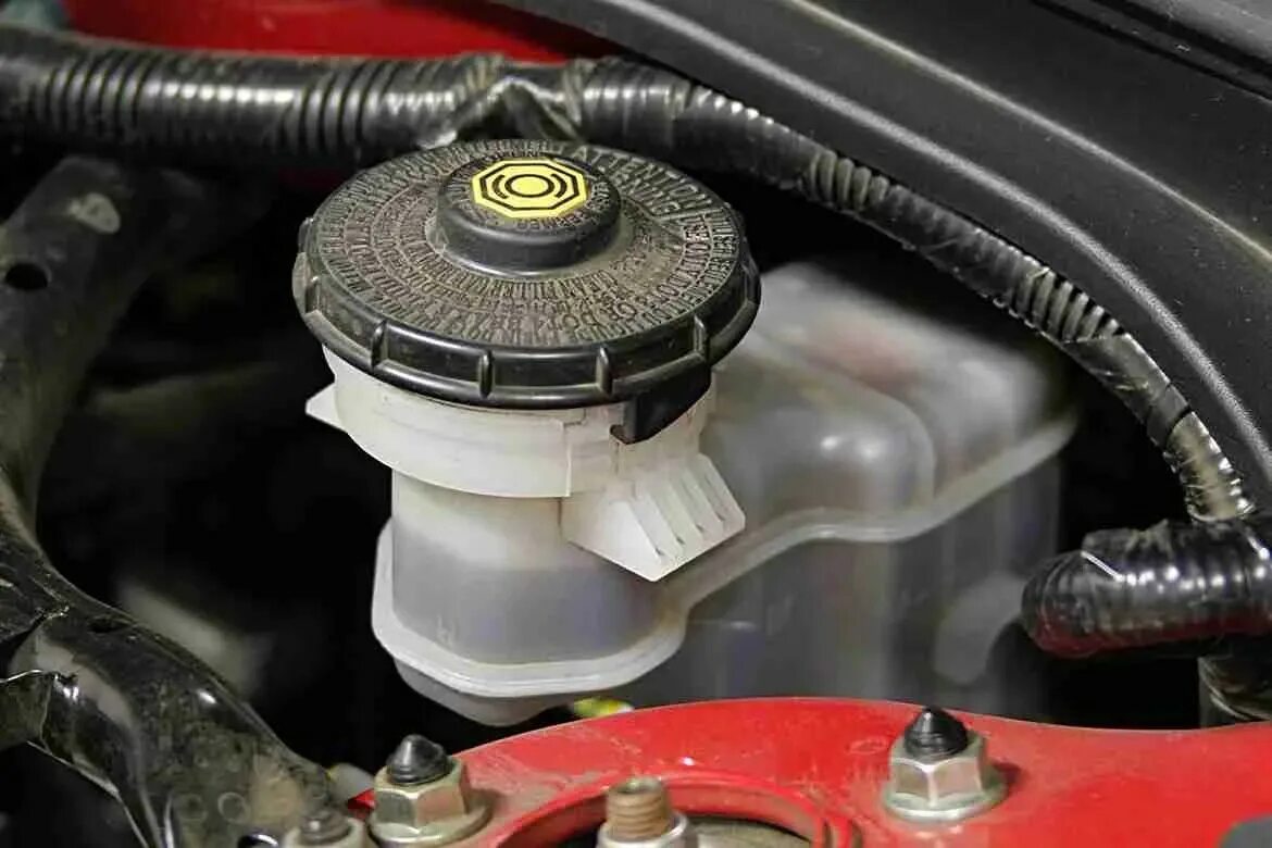 Fluid level low. Low brake fluid. c1202 brake fluid level low.