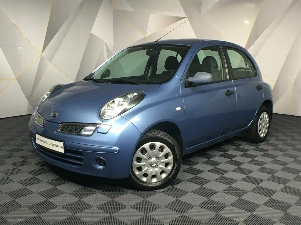 Nissan micra 12. Ниссан микра 2007 1. 2 автомат. Ниссан микра. Ниссан микра красный.