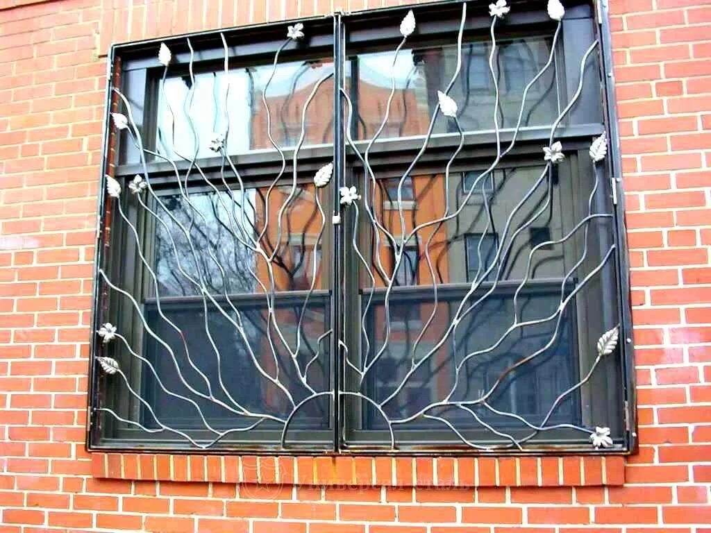 Решетки на окнах цена москва. Кованые решетки Нейбута 10а. Решетка оконная металлическая. Красивые сварные решетки на окна. Красивые кованые решетки на окна.
