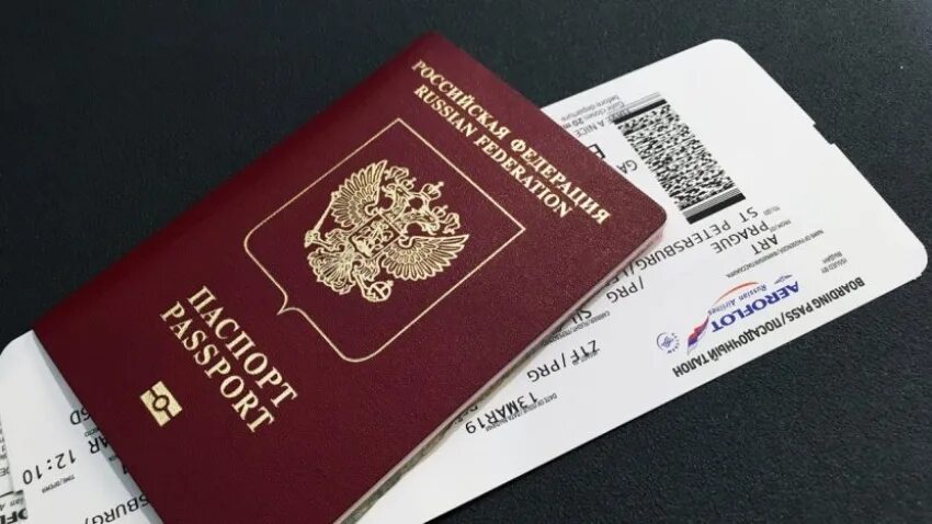 Заграничные билеты. Заграничные билеты. Заграничные билеты. Заграничные билеты. Билеты на самолет в руках.
