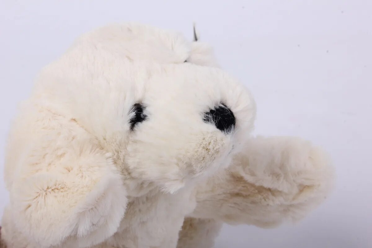 Включи белый мягкий. Мягкая игрушка Aurora собака Бастер 27 см. Мягкая игрушка собака белая. Мягкая игрушка собака лежачая.