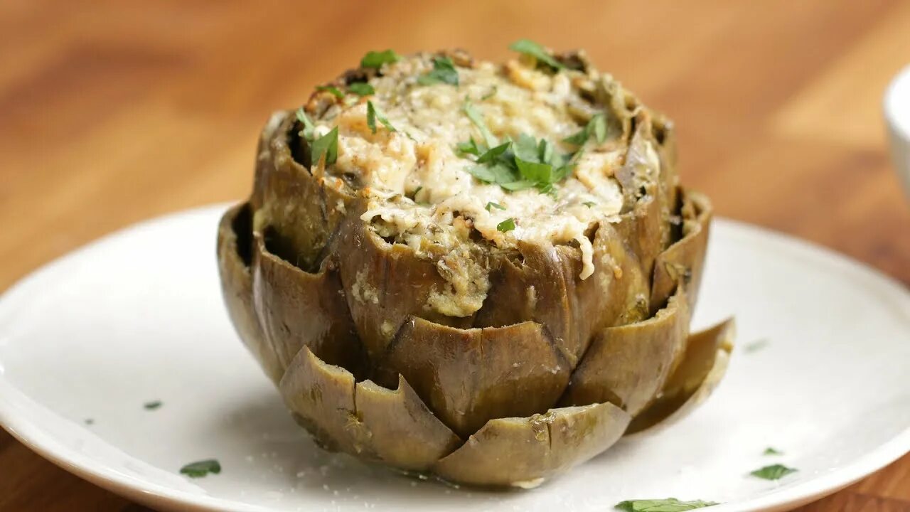 Grilled Artichokes - super easy!! trim and quarter the artichokes and slowly boi
