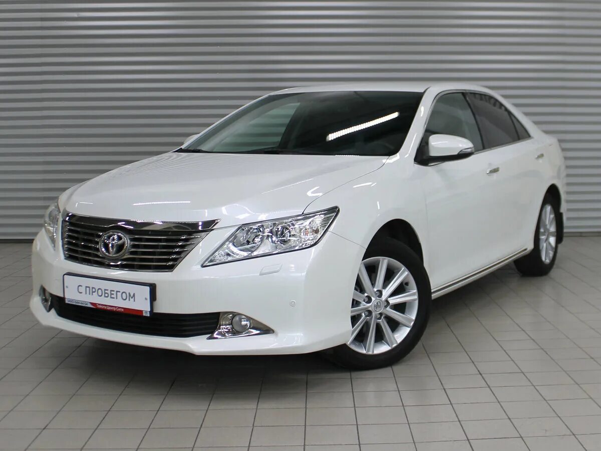 автомобиль тойота королла с пробегом. Toyota verso 2009-2012. Toyota camry 2. тойота майор. автосалон внутри.