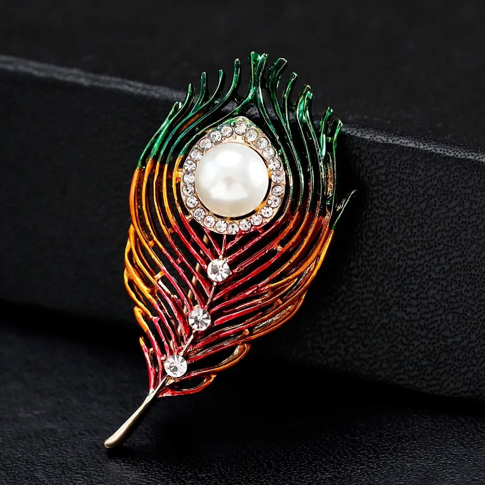 Swarovski generation серьги. Жемчуг перо. Жемчуг перо. Жемчуг перо. Зажим для волос золотой с камнями.