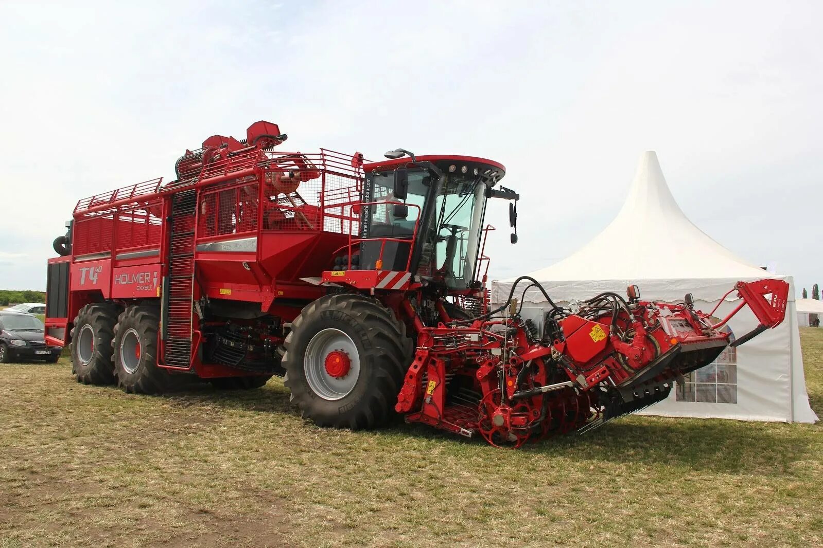 Г холмер какую страну представлял. Комбайн холмер т4. holmer terra dos t4-40. terra dos t4-40 комбайн свеклоуборочный. комбайн holmer terra dos.