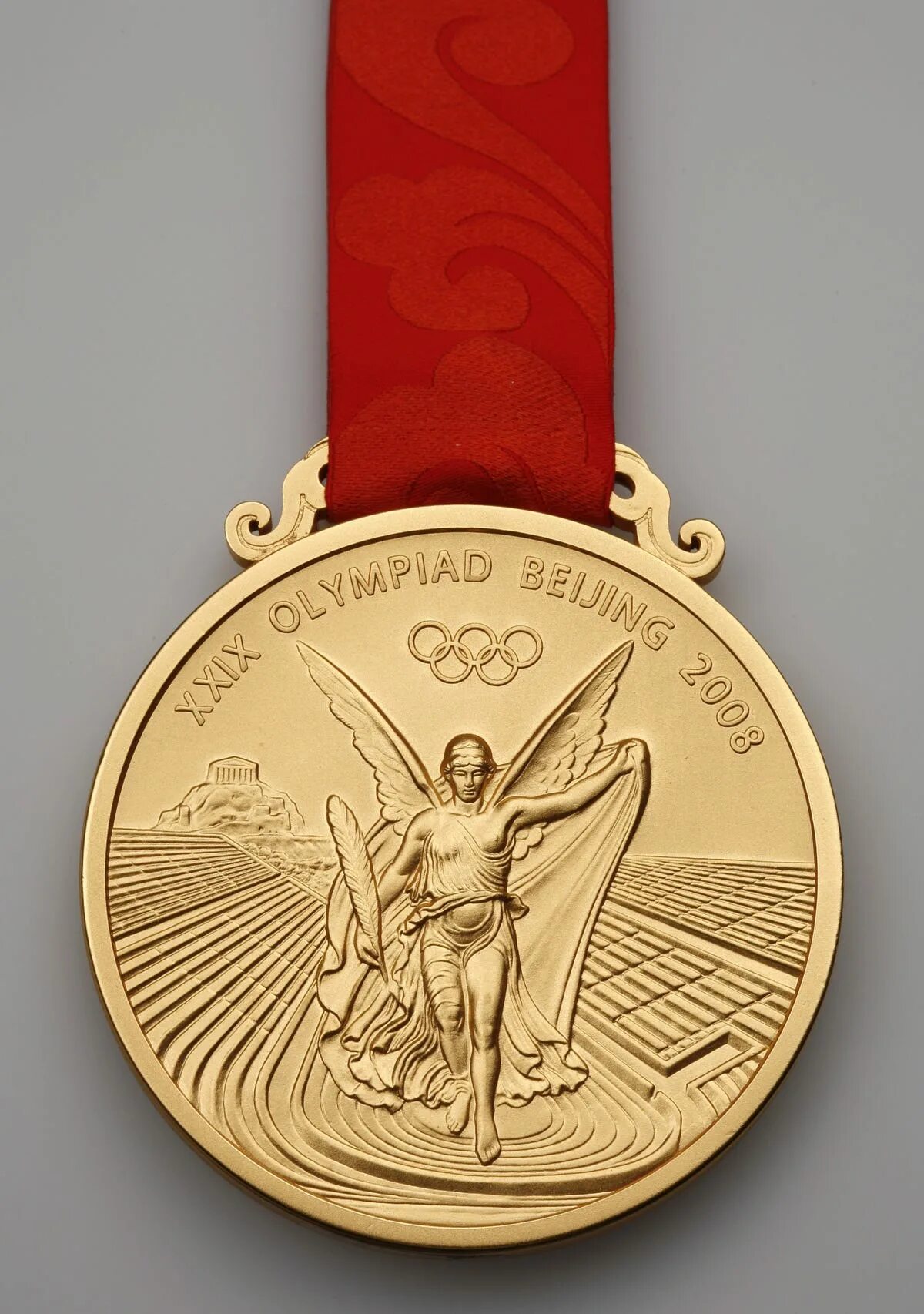 Olympic gold medal. Золотая медаль Олимпийских игр 2008. Золотая медаль Олимпийских игр 2008 года. Олимпийская Золотая медал. Медали для олимпийцев.