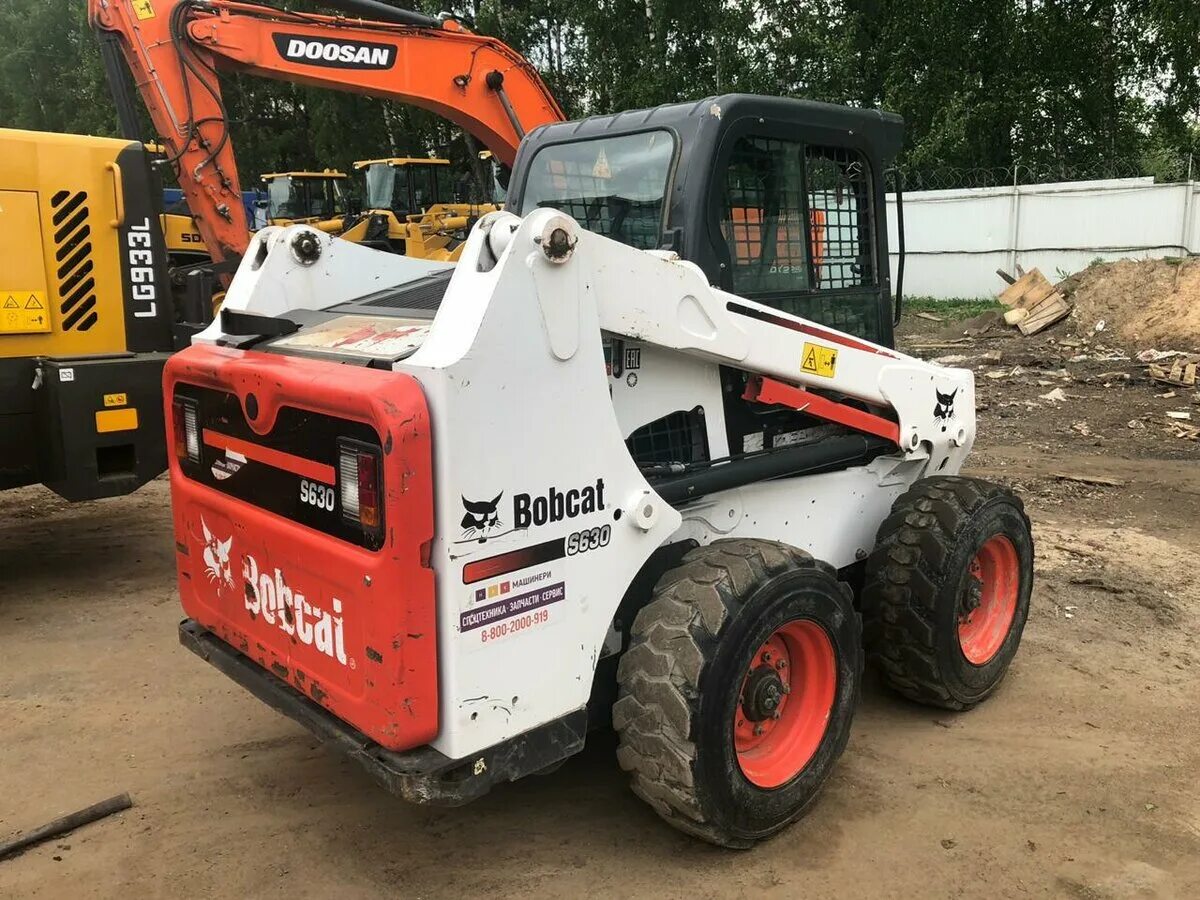 Купить бобкэт бу. Bobcat s630. Bobcat 630. Боккет 630. Бобкэт 350.