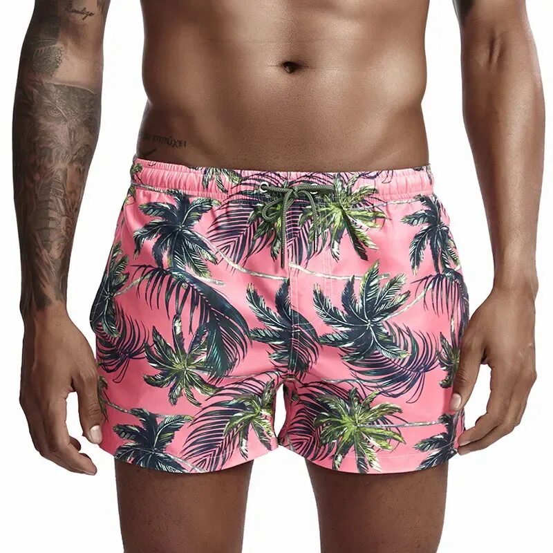 Мужские шорты с принтом. Шорты с пальмами мужские. Гавайские шорты. Гавайские шорты мужские. Пляжные шорты с пальмами.