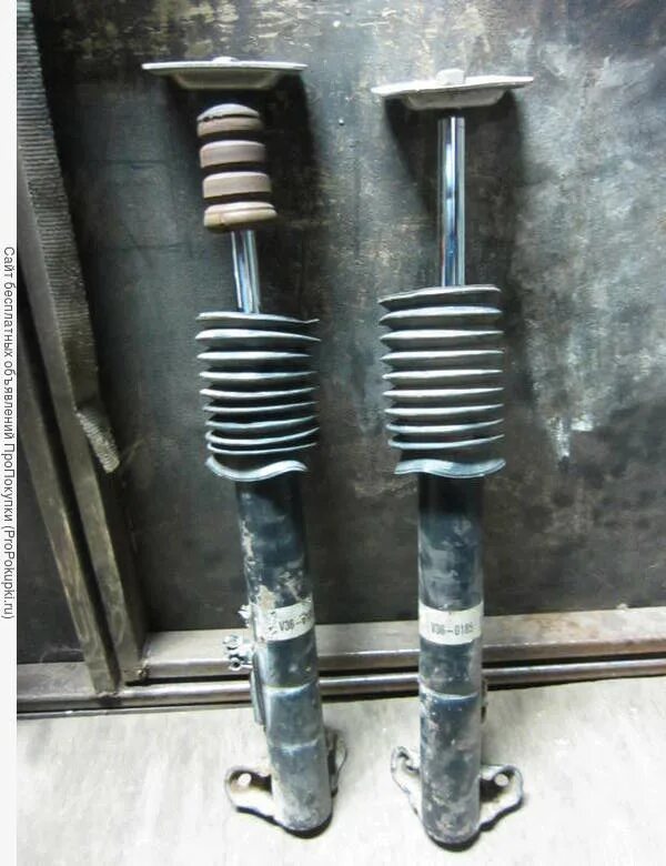 Передний амортизатор мерс 124. Задние амортизаторы мерседес 124 седан. W126 задние амортизаторы. Стойка мерседес w124. Задняя стойка тойота королла филдер 2002.
