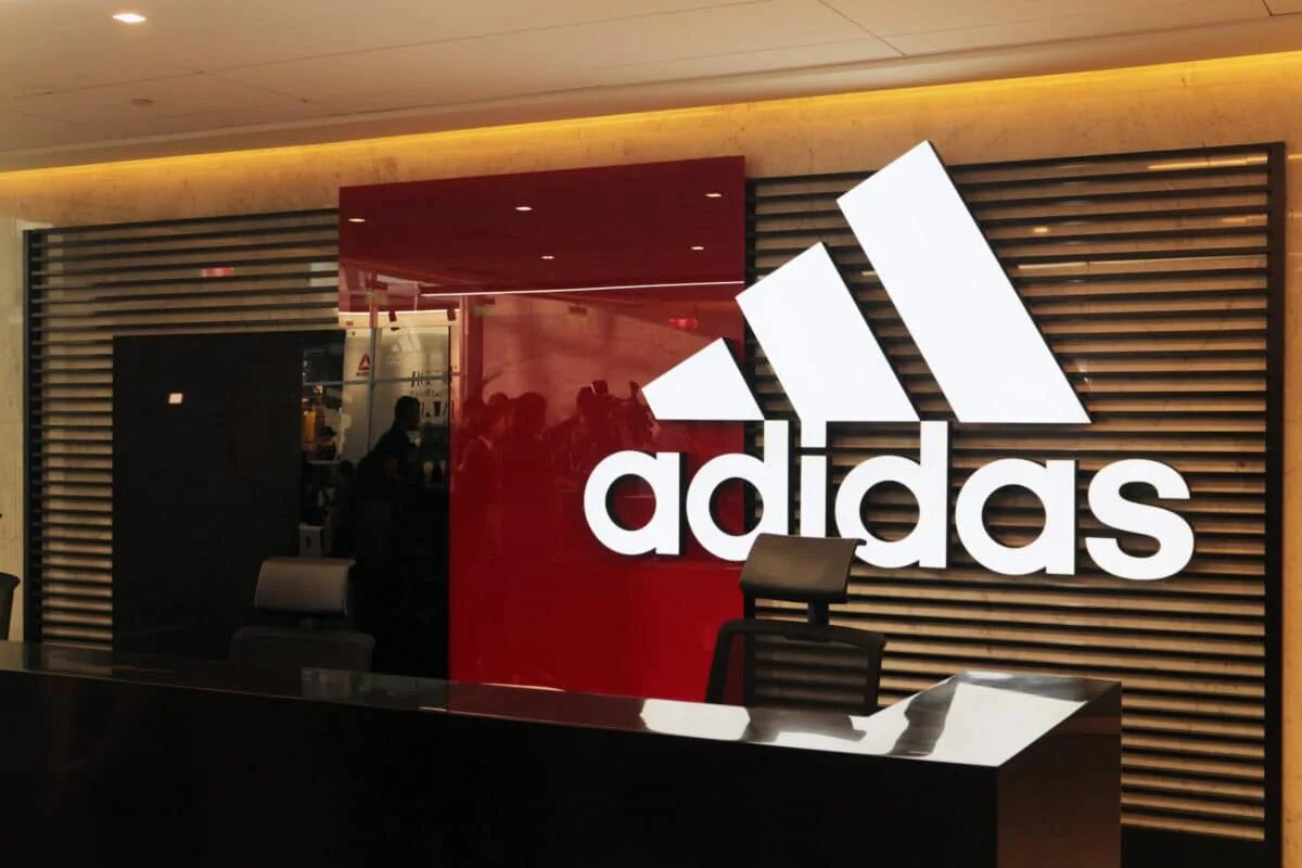 Adidas компания. Фирма адидас германия. Adidas тнк. Adidas тнк. Компания адидас.