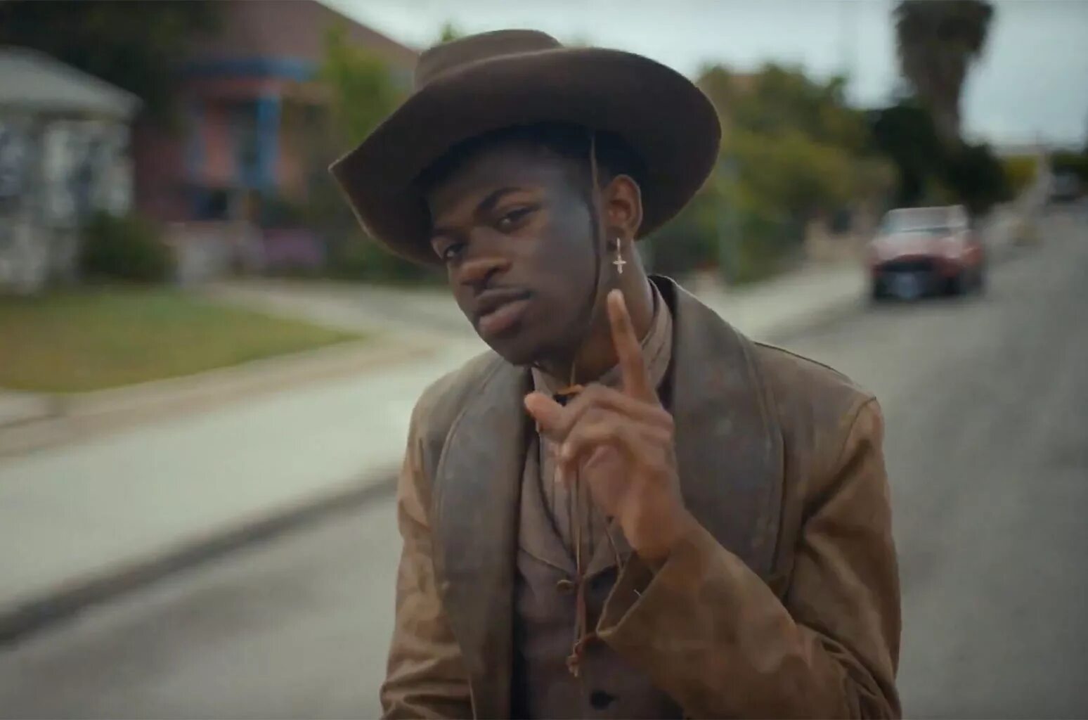 Песня ковбоя клип. Lil nas x ковбой. Lil nas x old Town Road. Лил нас Олд Таун роад. Old Town Road певец Lil nas x.