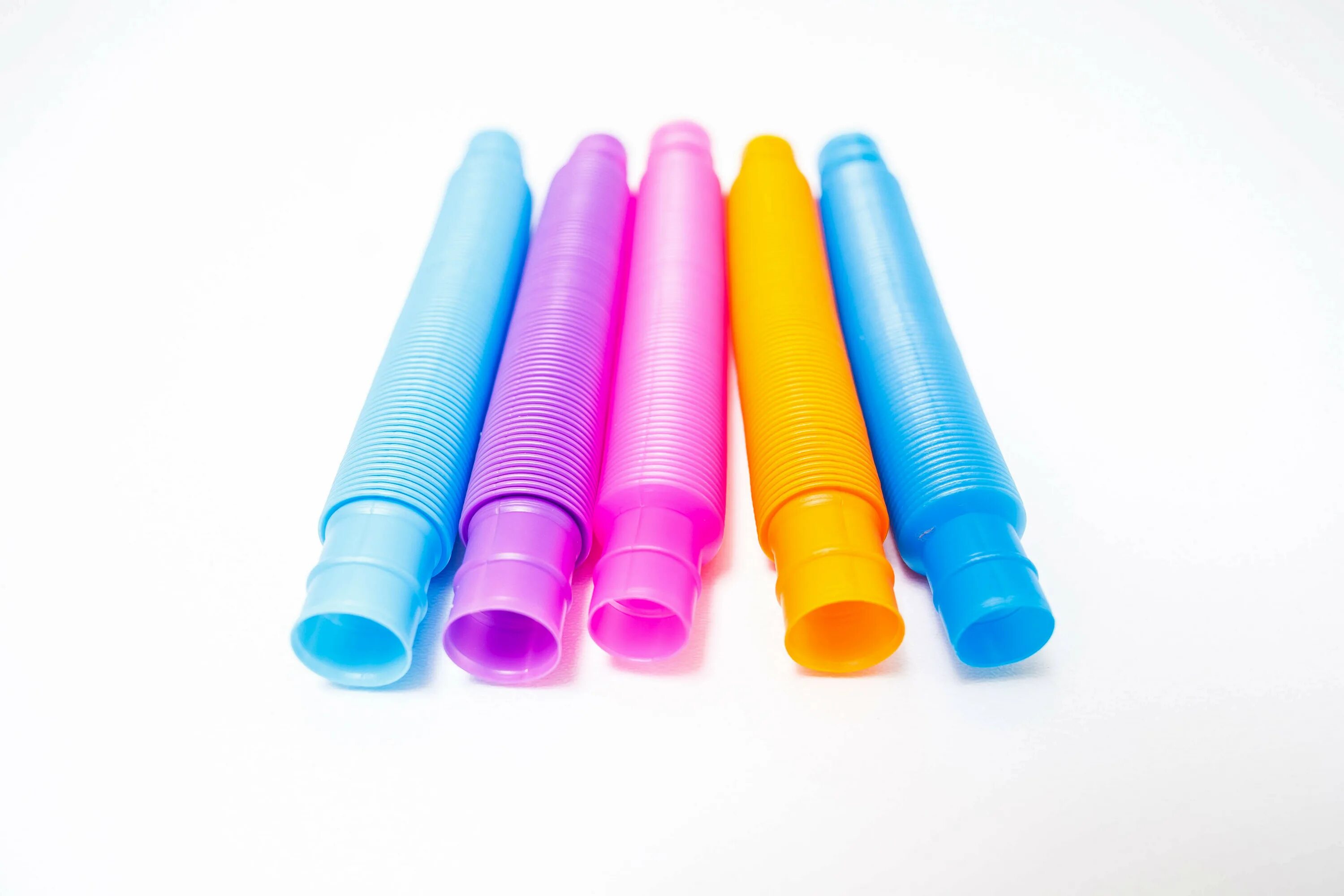 игрушка трубка гармошка pop toobs!. детская игрушка трубка гофра. антистресс трубочки pop tubes. гофра игрушка для детей. Slinky sl131 трубка-гармошка.