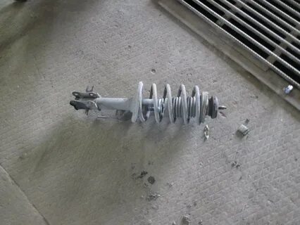 Передняя стойка авео т200