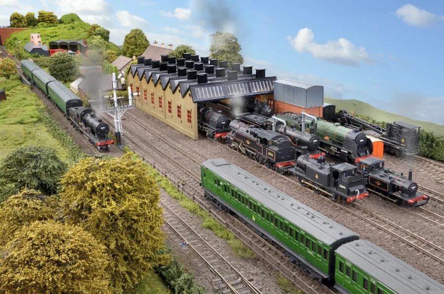 Фото моделей поездов. Hornby железная дорога. модели поездов с ландшафтом. макет железной дороги tgv. макетный паровоз хорнби.