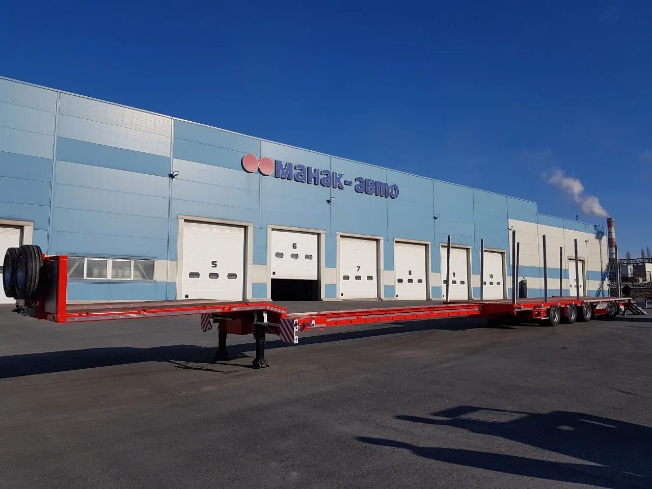 Манак авто старый оскол директор. Манак-авто manac 4. 4-х осный полуприцеп с вынесенной осью. Прицеп трал манак авто. Завод манак авто.