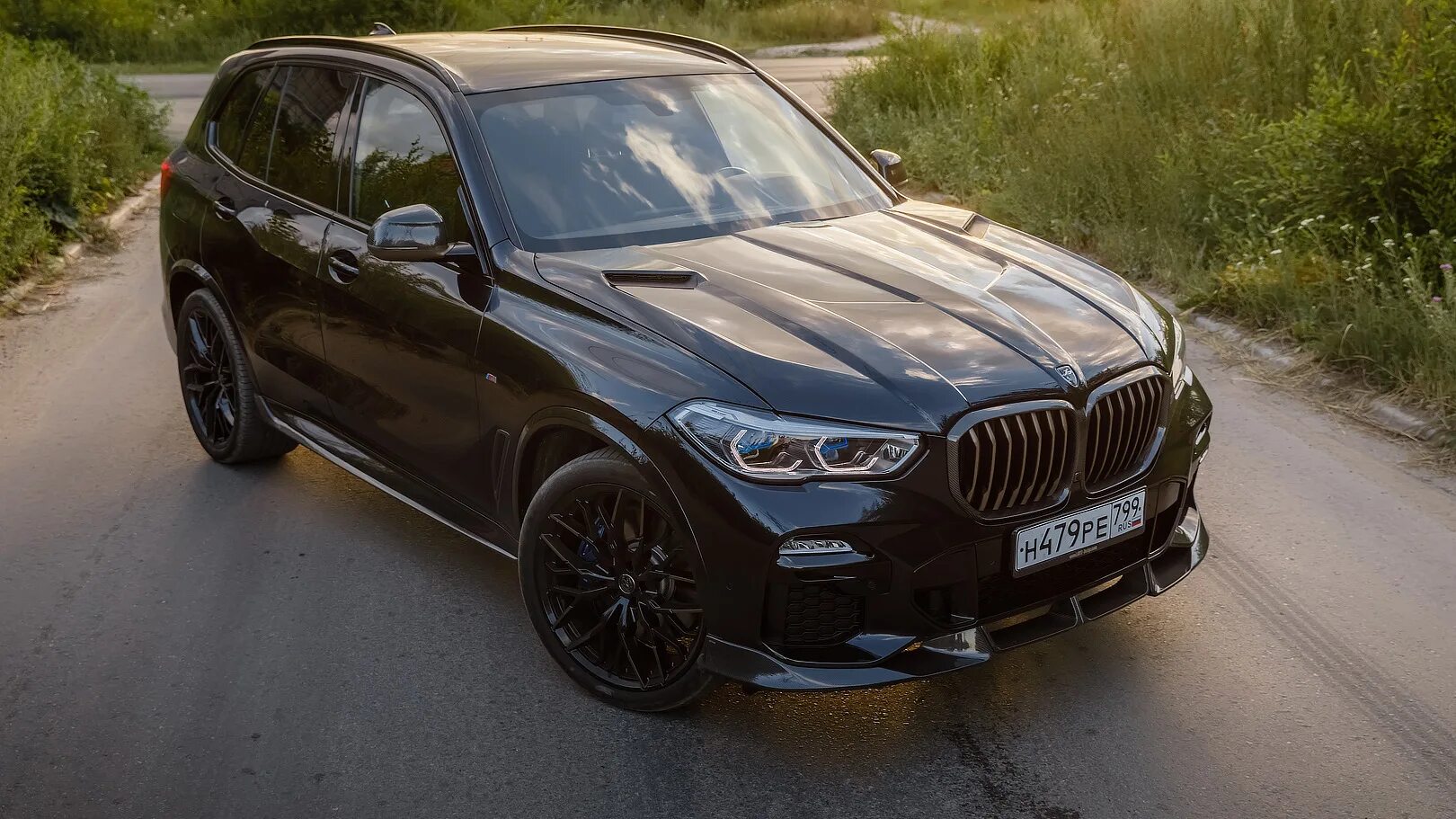 X5 g05 отзывы. БМВ x5 g05 черный. BMW x5 g05 черный карбон. Черный карбон металлик BMW x5. БМВ х5 черный карбон металлик.