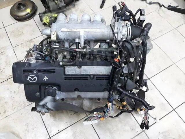 Двигатель на мазде додж 2 литра. Двигатель fp-de фото. Je-ze двигатель mazda 929. 5 v6. Мазда титан 2001 номер двигателя.