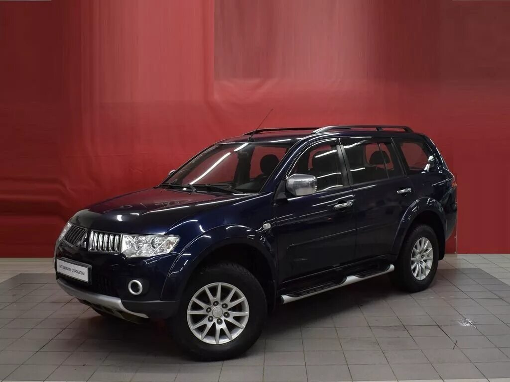 Mitsubishi pajero sport 2012. Митсубиши Паджеро спорт 2012. Mitsubishi Pajero Sport внедорожник синий. Mitsubishi Pajero Sport второе поколение.