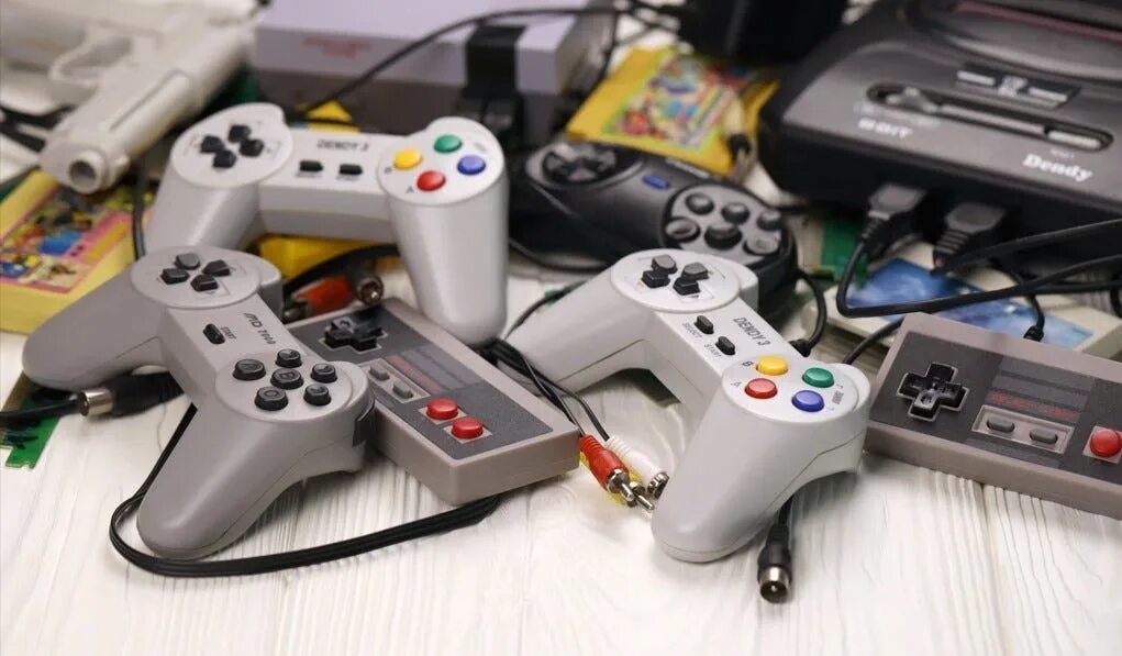 Джойстик и консоль sony playstation. Видеоигры с игровых приставок. Игровая приставка gameplayer x9. Видео игры консоль. Видео игры консоль.