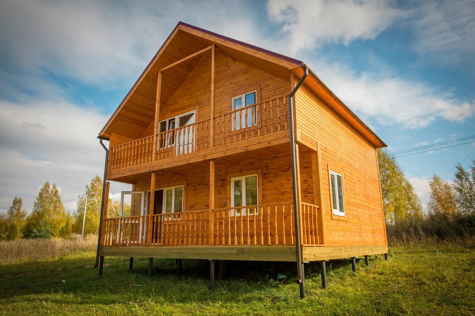 Коттедж из клееного бруса. Деревянный дом. Ск северный лес дома каркасные. Строительная компания лес. Строительная компания лес.