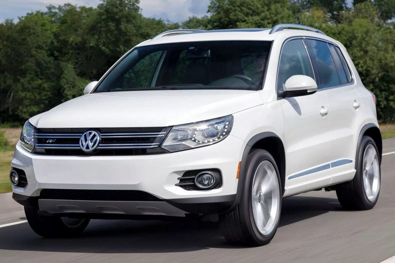 Volkswagen tiguan 2014. Фольксваген Тигуан 2014. Tiguan Volkswagen Tiguan. Volkswagen Tiguan Фольксваген Тигуан. Кроссовер Фольксваген Тигуан.