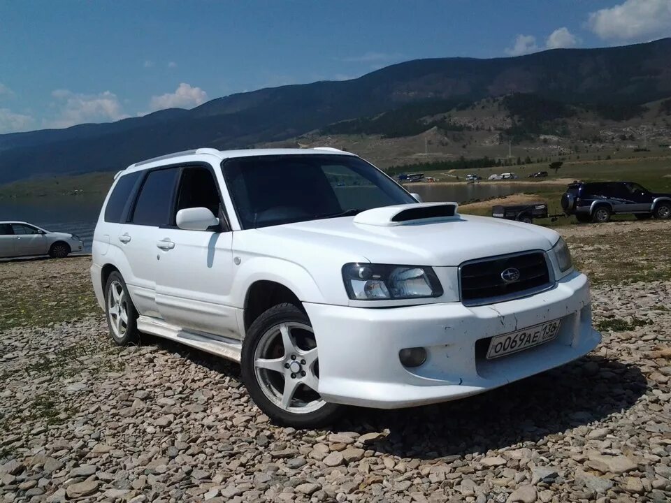 Купить субару форестер во владивостоке. Subaru Forester 2001 белый. Субару Форестер 1998 белый. Субару Форестер 2003 белый. Субару Форестер белый.