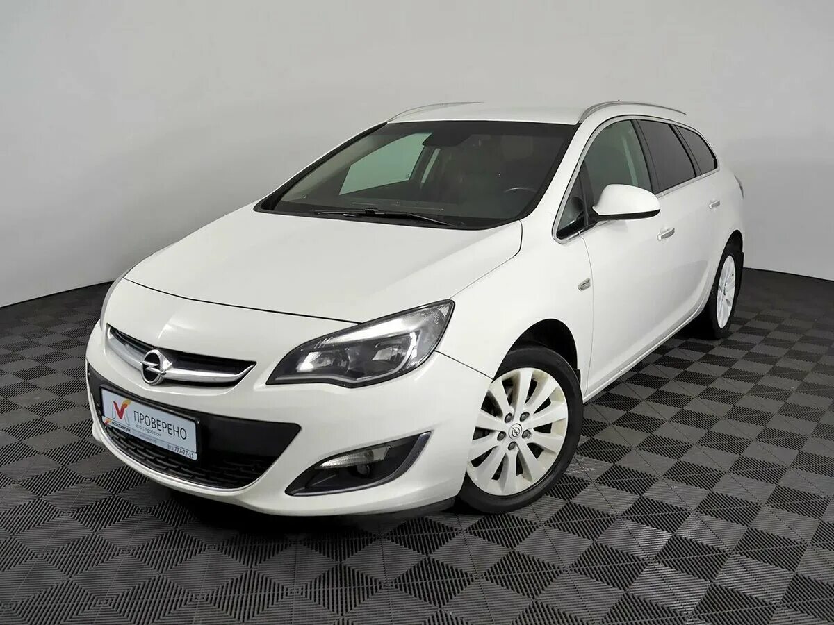 Opel Astra 2012 белый фото. Купить опель с пробегом в спб