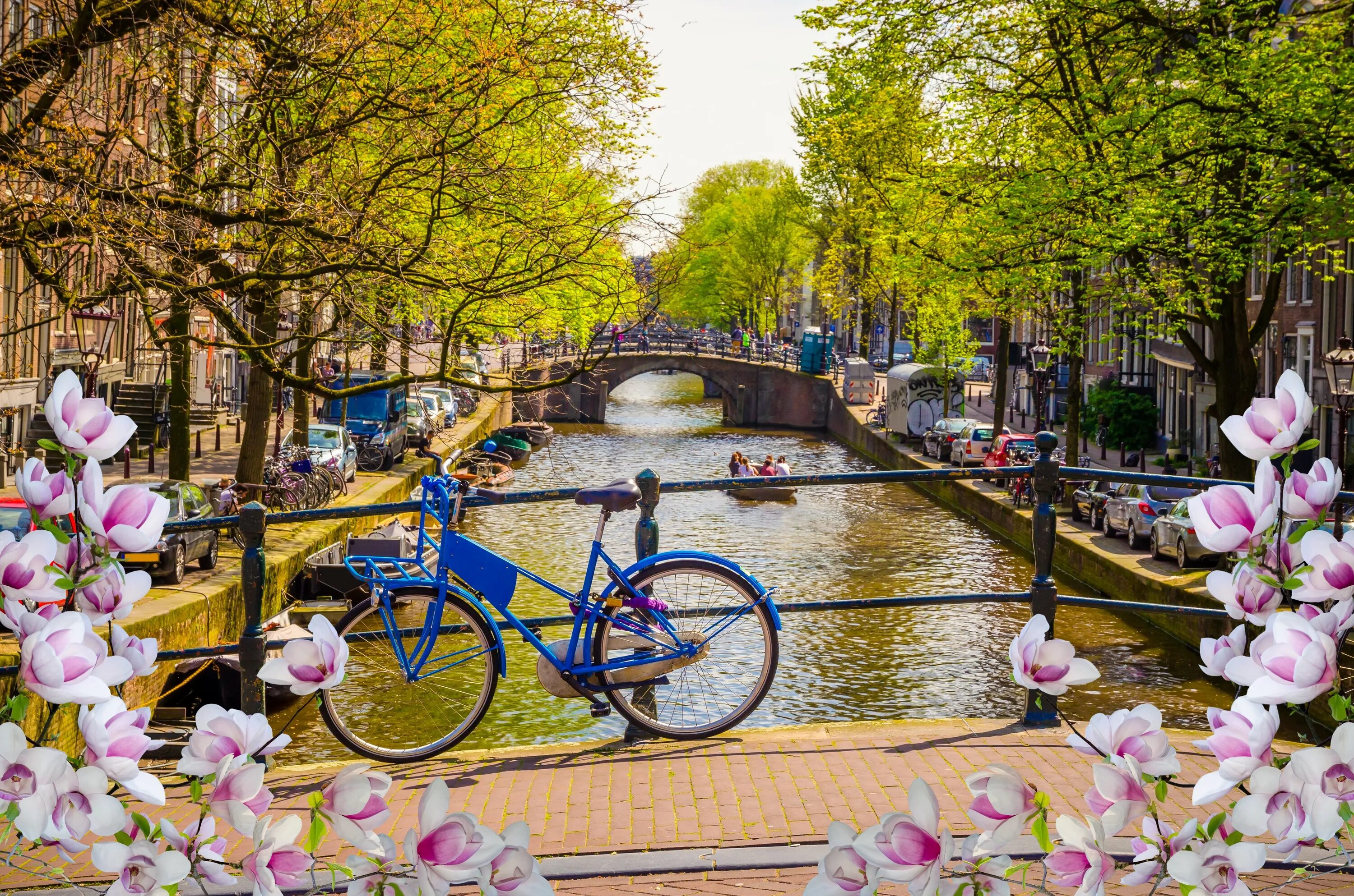 Амстердам город в Нидерландах парк Тиволи. Амстердам апрель парк. Париж река канал парк.