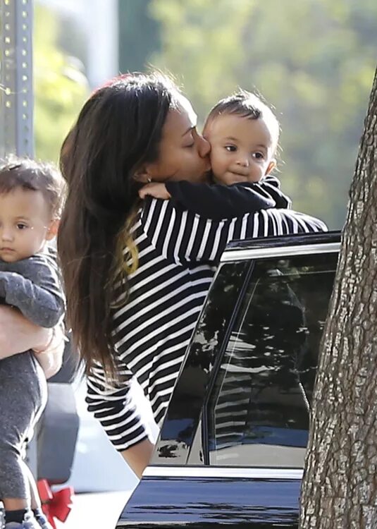 Celebs and their cute kids in 2017: Zoe Saldana carried her twin sons, Cy and Bo