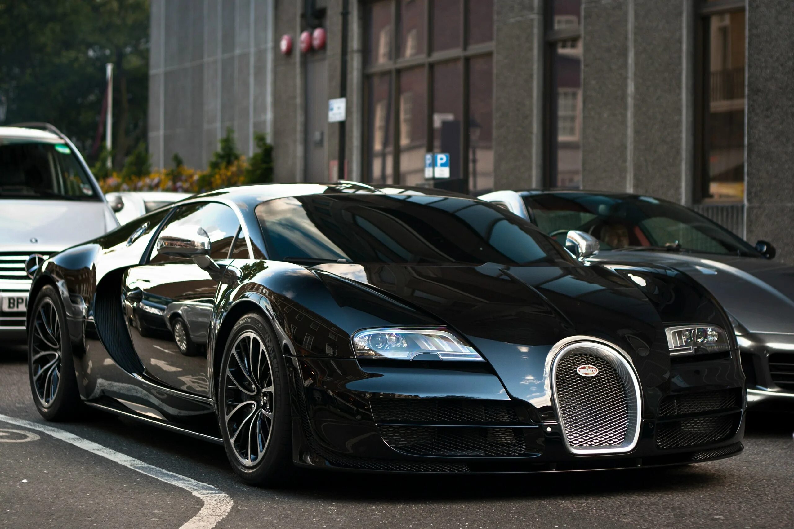 Bugatti Veyron 16.4 super Sport. Бугатти 2005. Бугатти Вейрон черная. Бугатти Вейрон 2021. Bugatti black