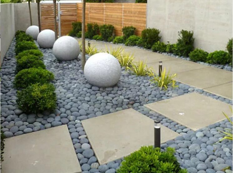 Большие бетонные шары. Бетонные шары для сада. Декоративные шары для ландшафта. Бетонные шары на клумбе. Бетонные клумбы.