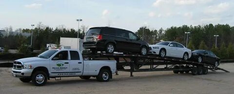 Водитель автомобиля с прицепом