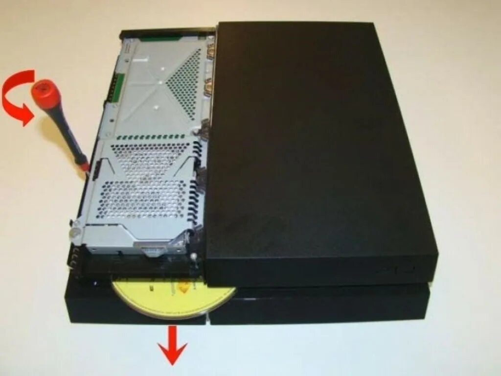Как вытащить диск. Ps4 cd rom. пс 4 извлечь диск. дисковод ps4. ps4 винт ручного извлечения диска.