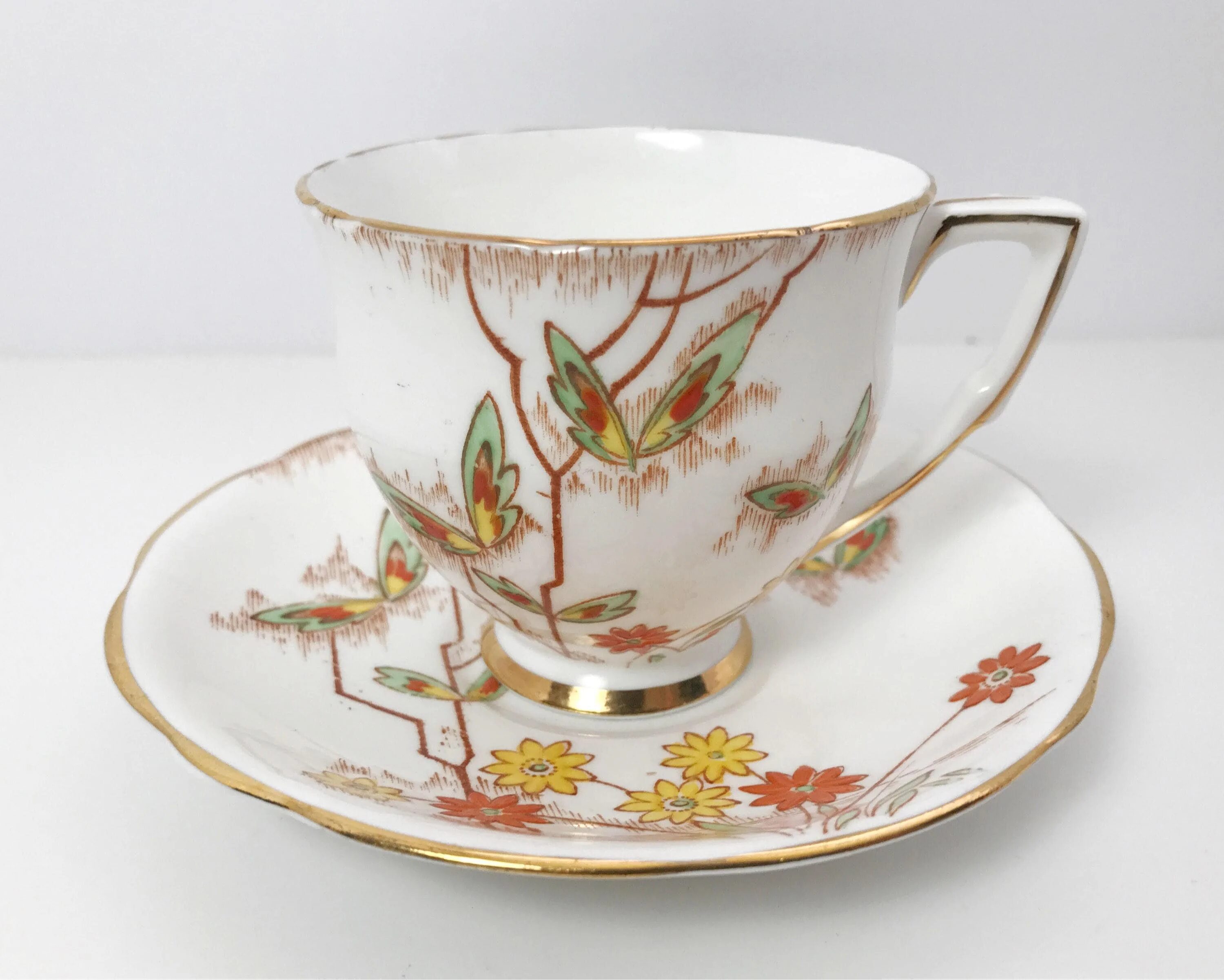 Фарфор fine bone. Butterfly fine bone china чашка. fine bone china england design butterfly чашка. fine bone china england design посуда butterfly. fine bone china england design butterfly чашка с блюдцем.