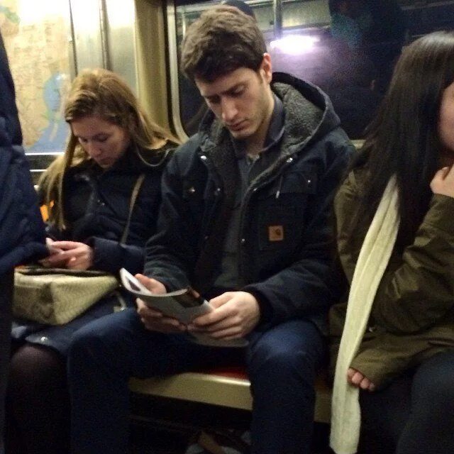 He will probably. Читающие парни в метро. Мужчина с книгой в метро. Парень читает книгу в метро. Свело метро.