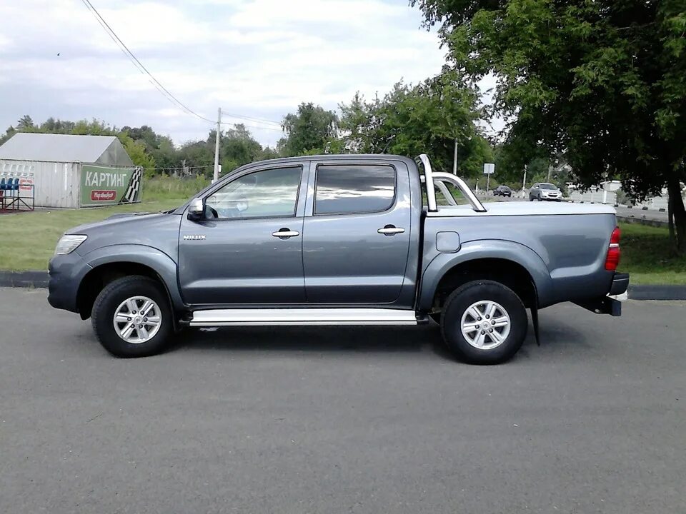 Тойота хайлюкс 2012 цена. Toyota Hilux 2012. Toyota Hilux серый. Тойота Хайлюкс 2012 года. Тойота Hilux серая.