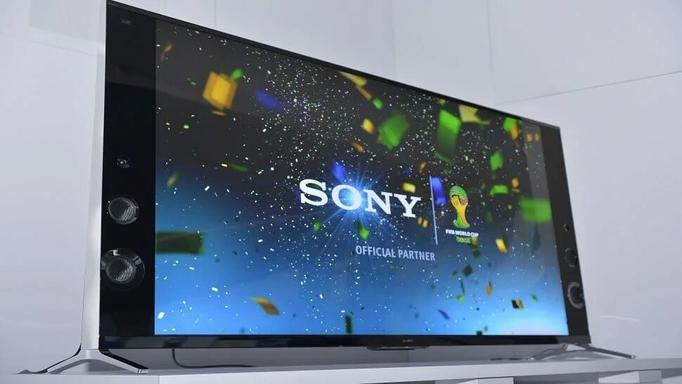 Телевизоры sony 2024. Телевизор Sony со встроенными колонками. Телевизоры сони с динамиками. Телевизор Sony с динамиками по бокам. Sony ультраширокоформатный телевизор.