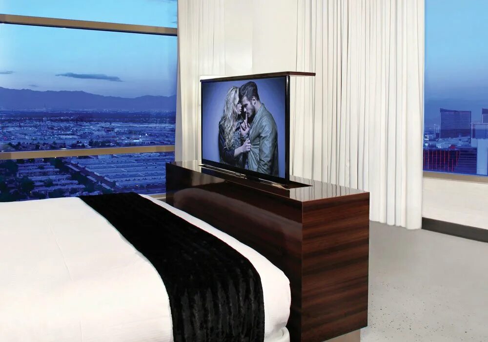 Купить выдвижной телевизор. Выдвижной телевизор в спальне. Выезжающий телевизор. Тумба с выезжающим телевизором. Кровать с телевизором выдвижным.