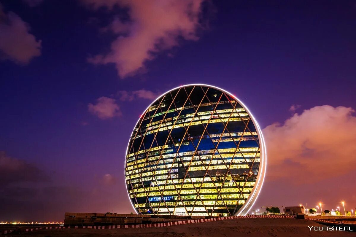 Round build. Небоскреб Aldar hq . Абу Даби, ОАЭ.. Aldar Headquarters building (Абу-Даби, ОАЭ, 2010). Круглый небоскреб в Абу Даби. Круглый небоскреб Aldar hq в Абу-Даби.